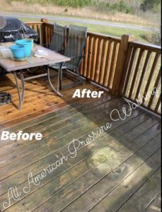 A wooden deck, half of which has been pressure washed and half hasn't (yet). The results are night and day.